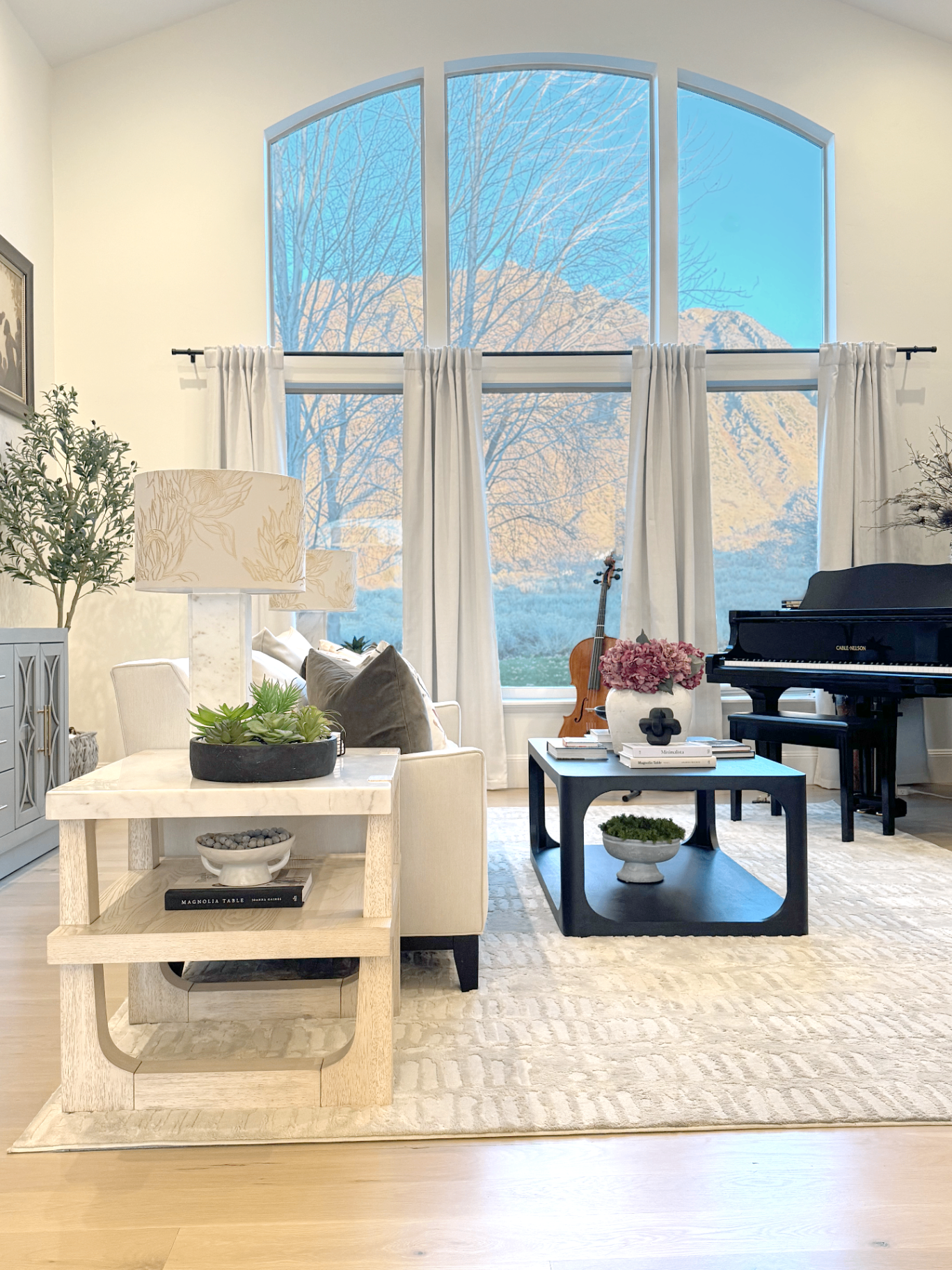 Living room with mountain views designed by Revive Studios